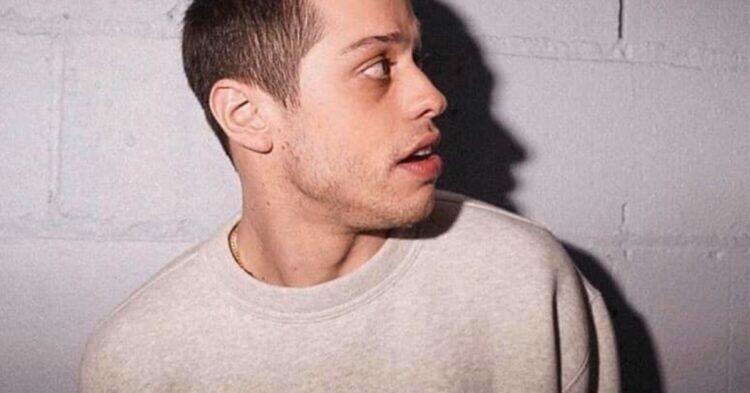 Pete Davidson looking to the side