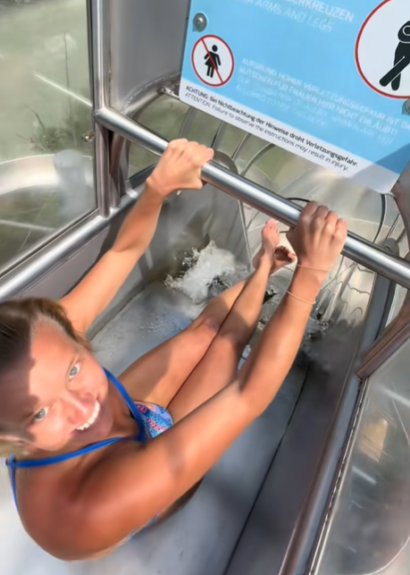 Screenshot of video of diver getting ready to get into the slide (TikTok | rhiannaniffland)