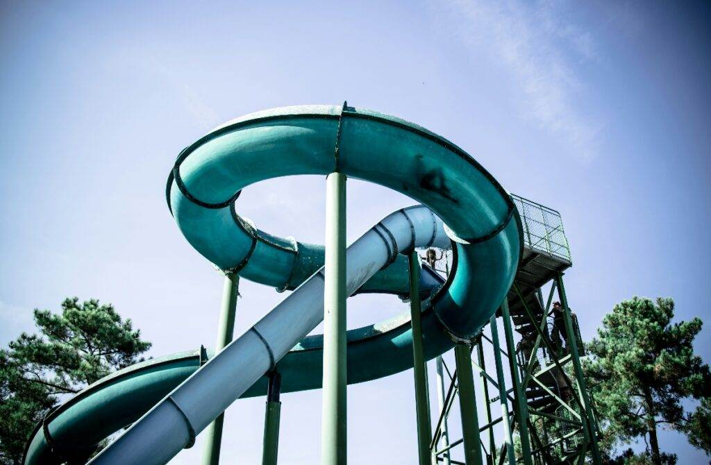 Waterpark water slides (Unsplash | Iker Urteaga)