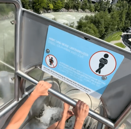 'No women' sign on water slide in Area 47 waterpark (TikTok | rhiannaniffland)