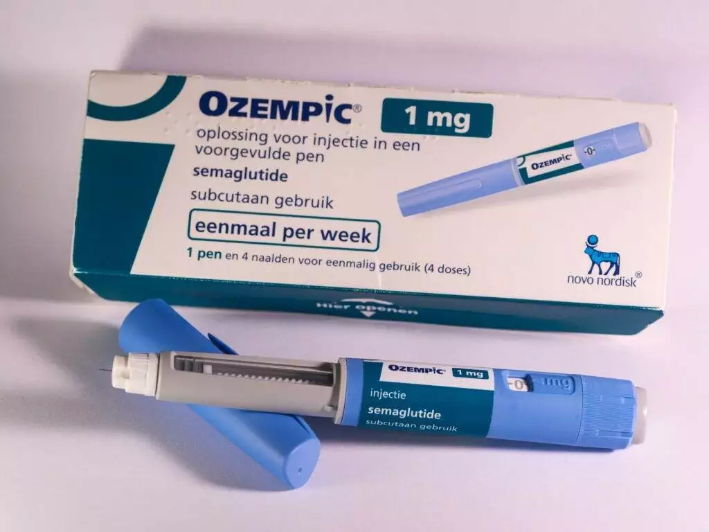 A tube of oezpic sitting next to a tube of oezpic