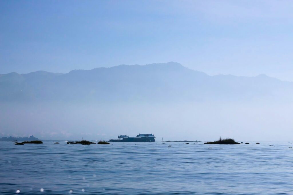 white ship on sea during daytime