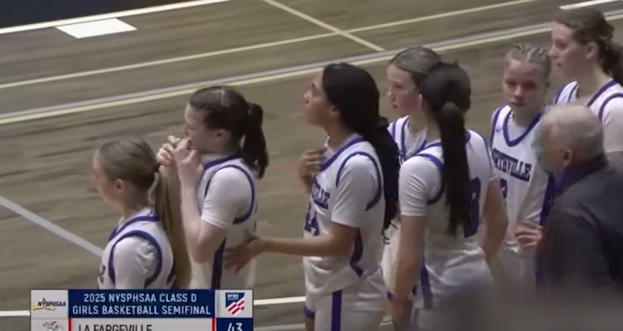Basketball player crying before coach pulled her hair (WNYT)