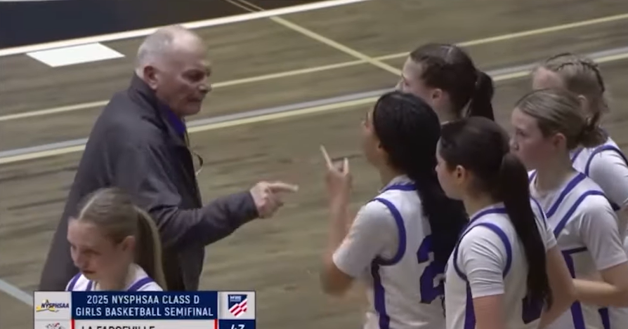 Coach and player arguing and pointing fingers at each other (WNYT)