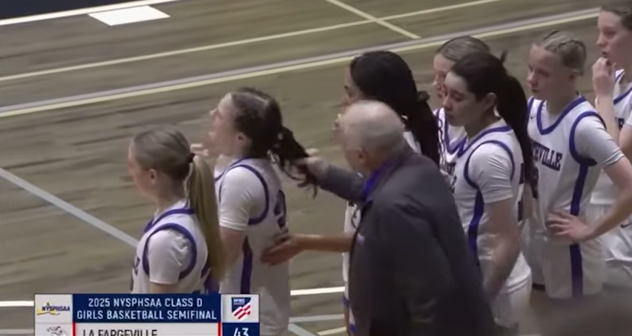 Coach pulling player's hair (WNYT)