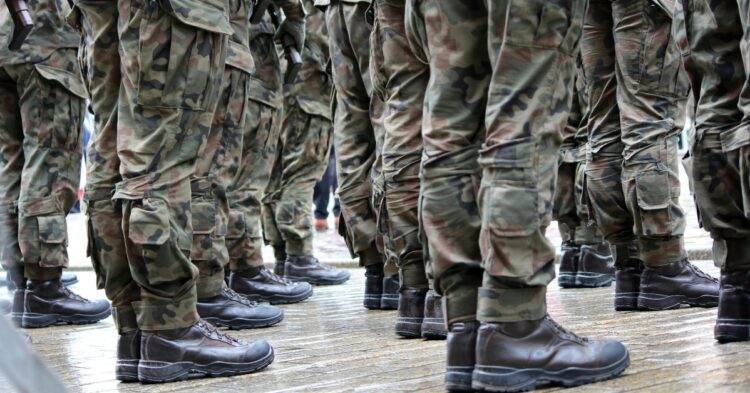 Group of military men standing next to each other