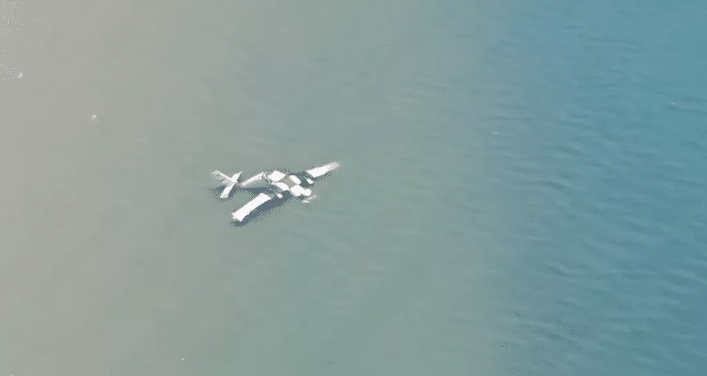 Plane in the water appears to be broken in two - Thailand police plane crash
