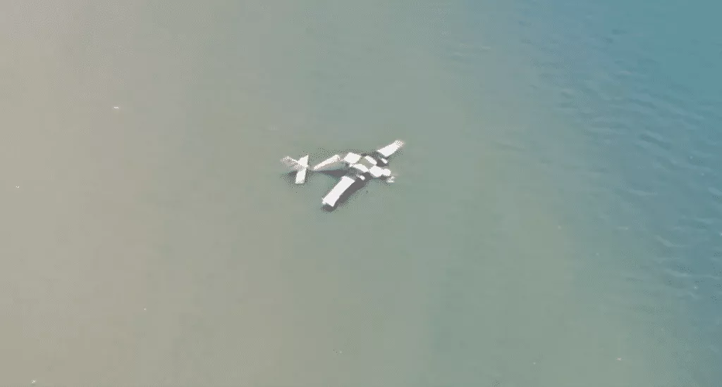 Plane in the water appears to be broken in two - Thailand police plane crash
