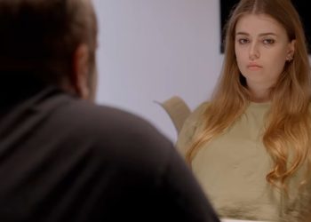 Jamie-Lee Arrow sitting in front of her cannibal father Drabbad
