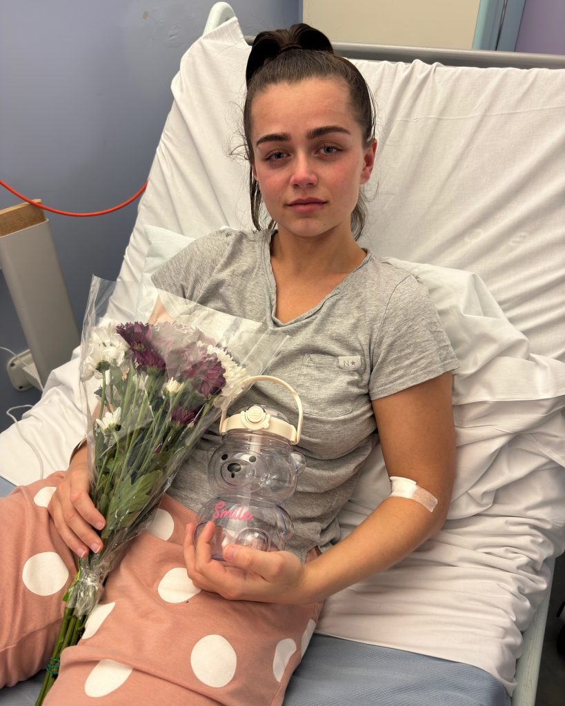 Georgia O’Connor in a hospital bed