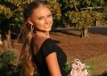 Anna Grace Phelan holding flowers