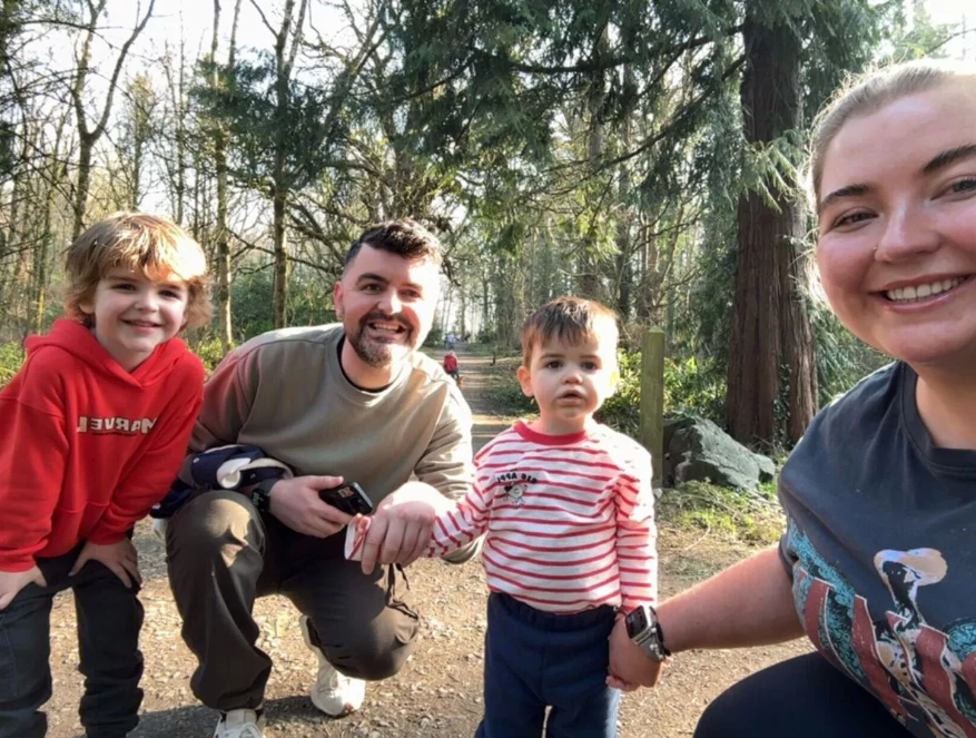 Chester with his parents and older brother