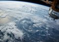view of Earth and satellite