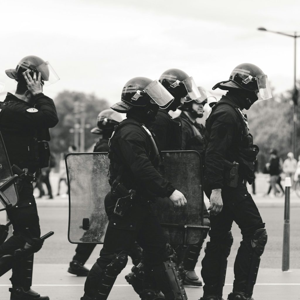 group of police grayscale photo
