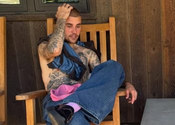 Justin Bieber sitting on porch chair