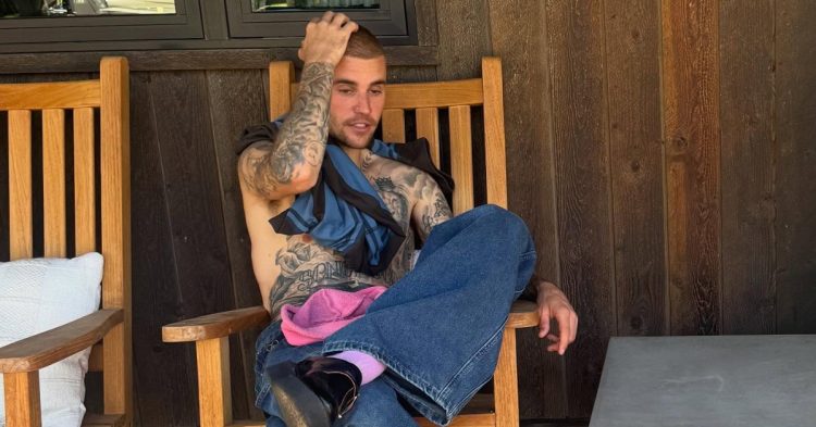Justin Bieber sitting on porch chair