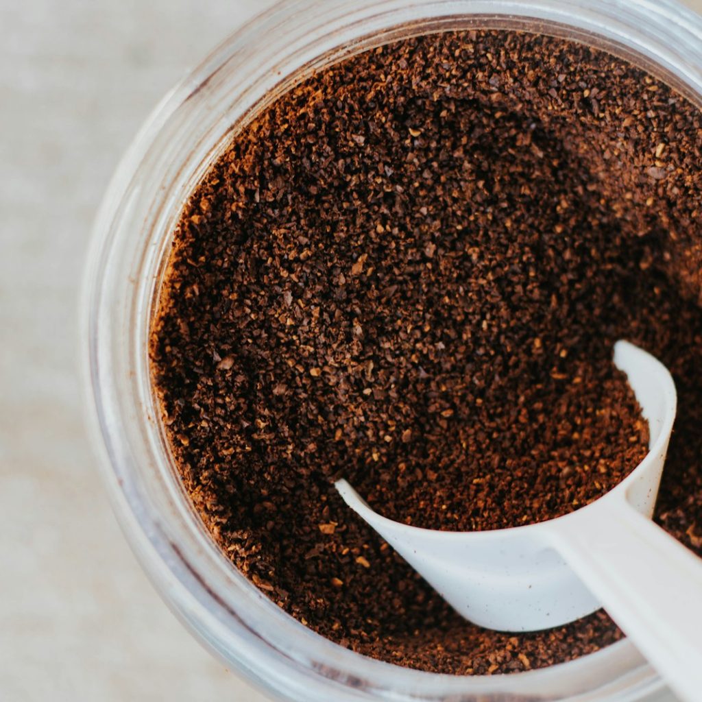 white table spoon on coffee