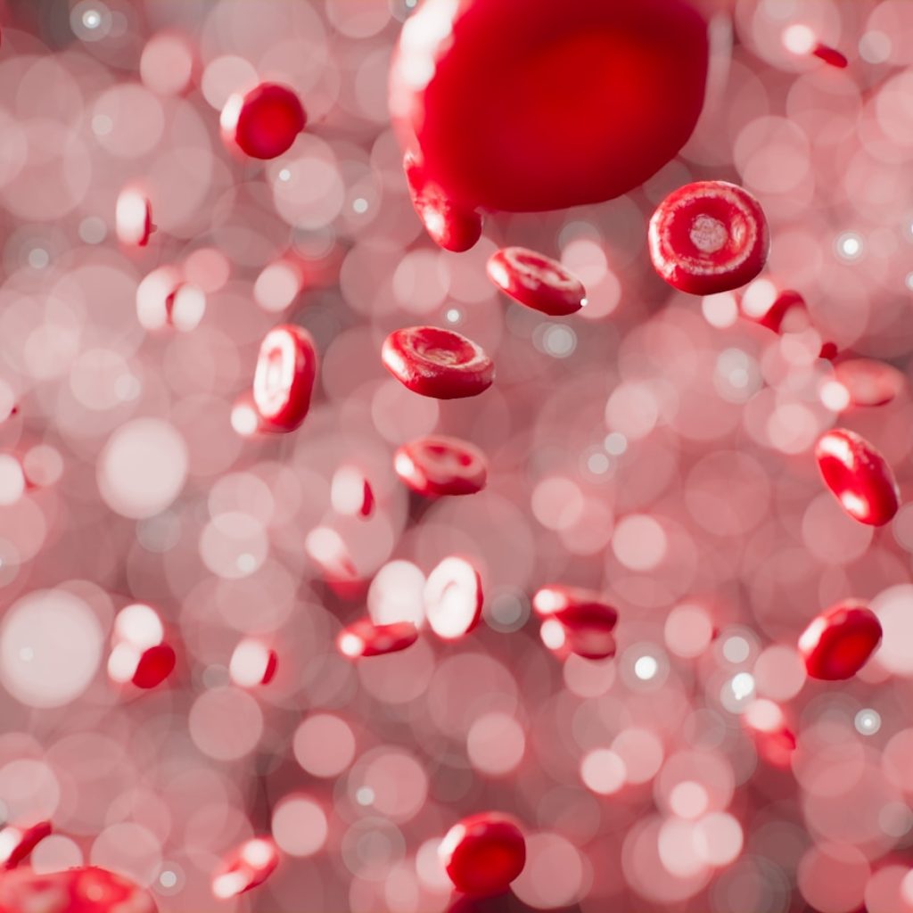 a bunch of red bubbles floating in the air