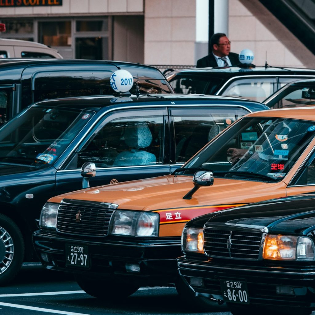 blue and brown car on the street