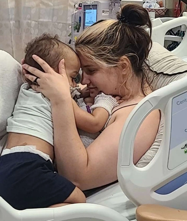 Madeline Dunn and her toddler Kai at the hospital
