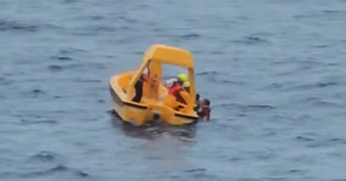 Rescue Boat saving father and daughter