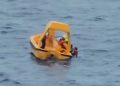 Rescue Boat saving father and daughter