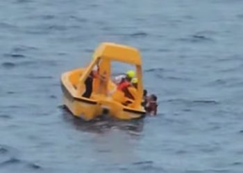 Rescue Boat saving father and daughter