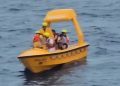Rescue Boat saving father and daughter