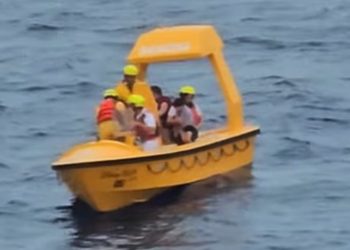 Rescue Boat saving father and daughter