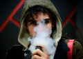 Young man vaping